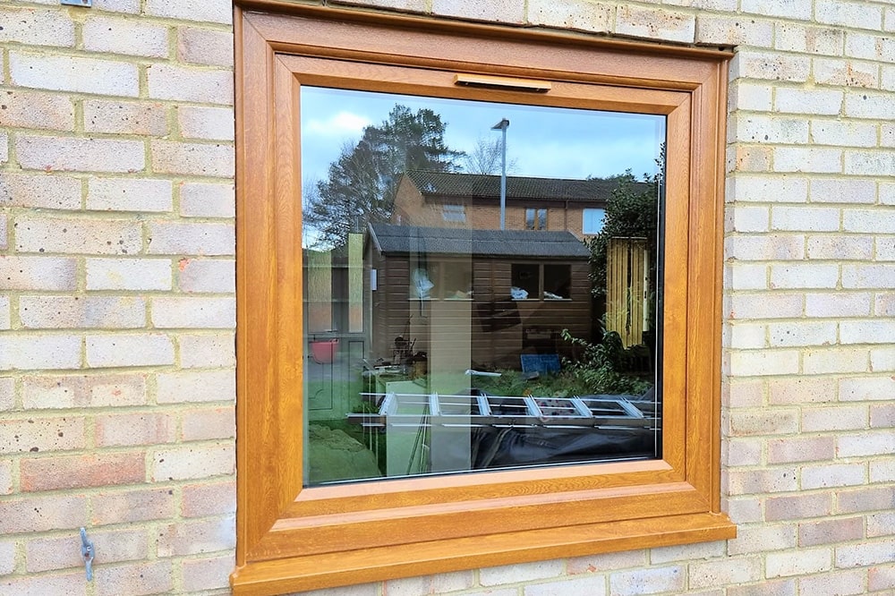 Tilt and Turn Woodgrain Effect Window Installed in Ascot